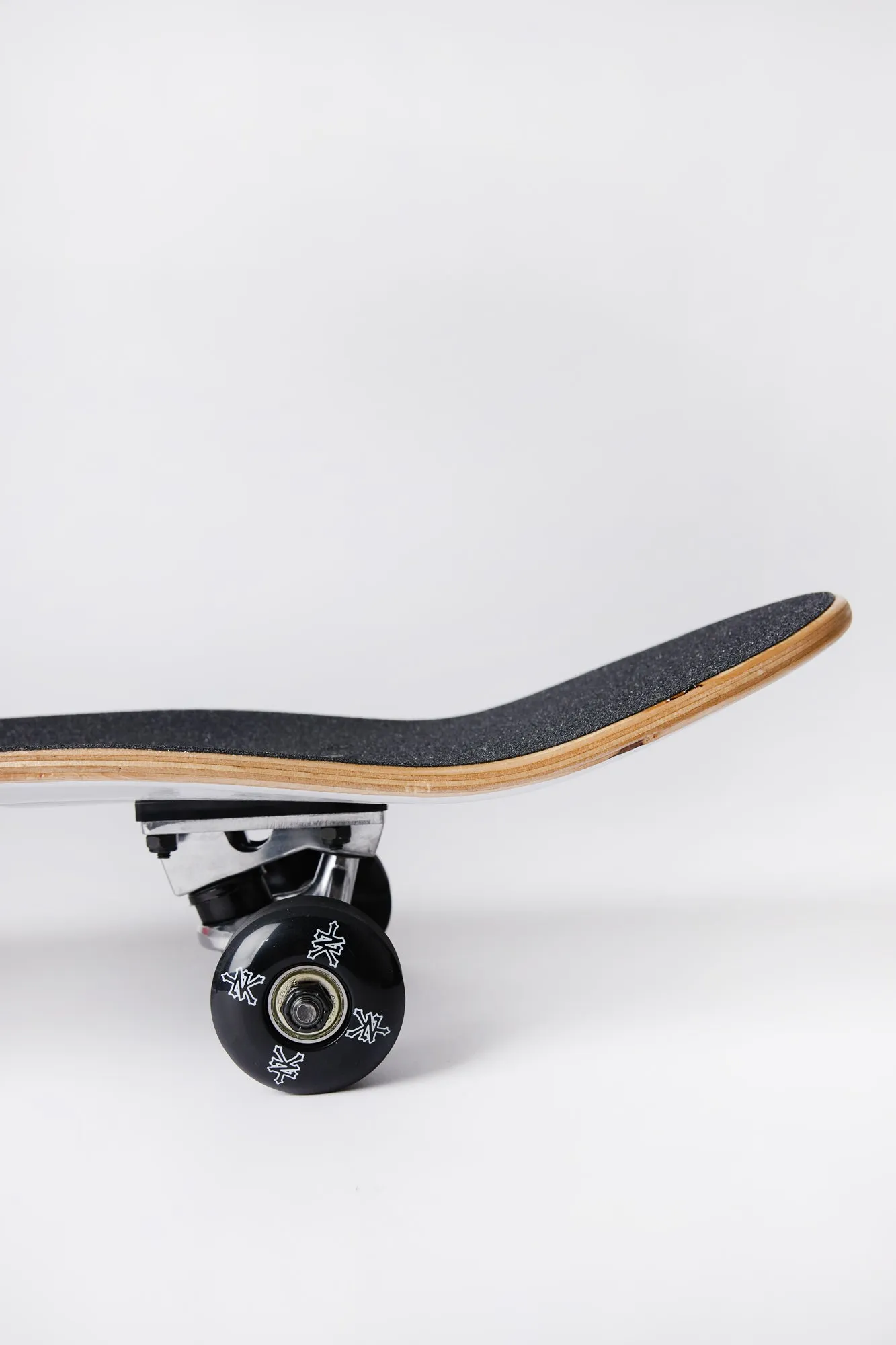 Skateboard imprimé logo noir et blanc Zoo York 8"